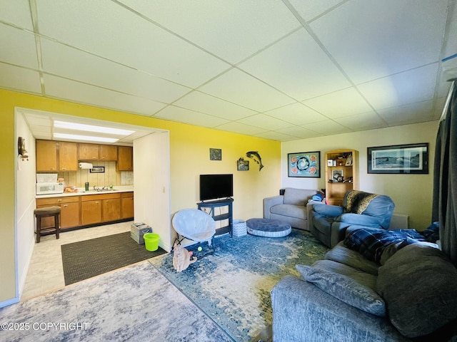 1310 Madsen Ave, Kodiak, AK 99615 - living room featuring a drop ceiling