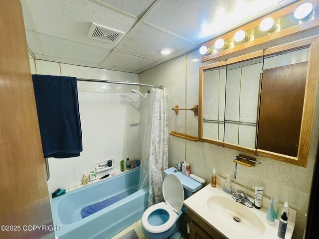 1310 Madsen Ave, Kodiak, AK 99615 - bathroom featuring shower / bath combo with shower curtain, vanity, and toilet