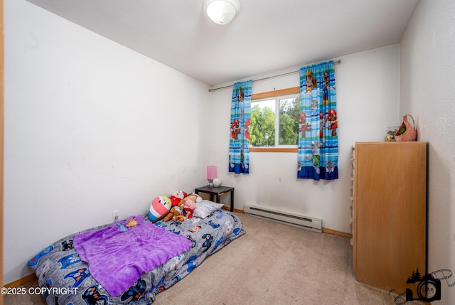 639 E Beaver Ave, Palmer, AK 99645 - carpeted bedroom with a baseboard heating unit