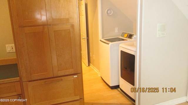 2024 Oxbow Cir, Anchorage, AK 99516 - laundry room featuring washing machine and dryer and light wood-style flooring