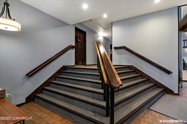 836 M St # 215, Anchorage, AK 99501 - stairway with recessed lighting and brick patterned floors