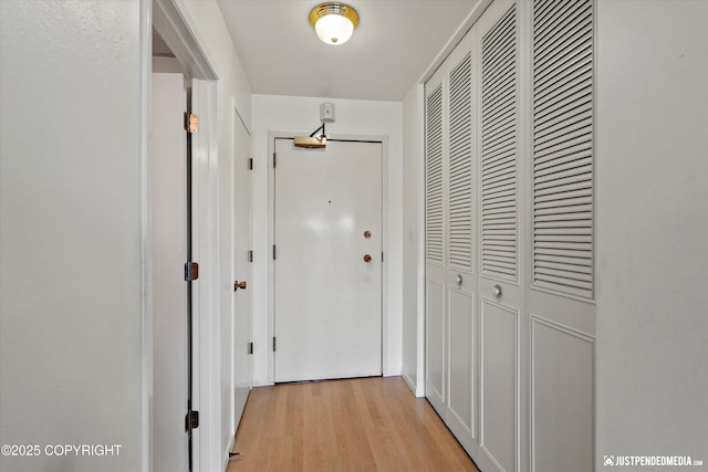 836 M St # 215, Anchorage, AK 99501 - hall featuring light wood-type flooring