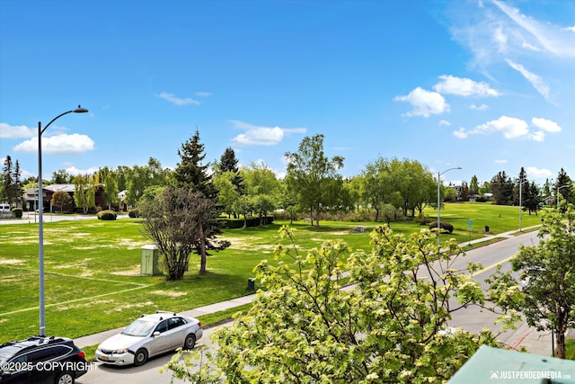 836 M St # 215, Anchorage, AK 99501 - view of community featuring a lawn