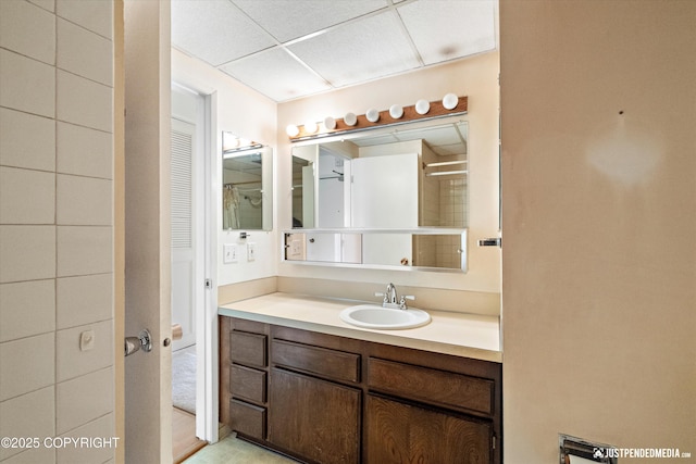836 M St # 215, Anchorage, AK 99501 - bathroom featuring vanity and a paneled ceiling