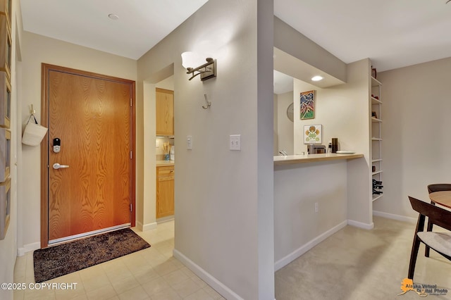 1200 I St # 206, Anchorage, AK 99501 - entrance foyer featuring baseboards and recessed lighting