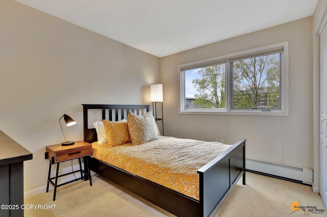 1200 I St # 206, Anchorage, AK 99501 - bedroom featuring a baseboard heating unit, carpet, and baseboards