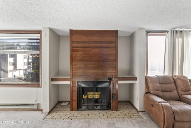 1003 Wildrose Ct # 1003, Anchorage, AK 99518 - living room with a baseboard heating unit, a textured ceiling, carpet flooring, a multi sided fireplace, and baseboards