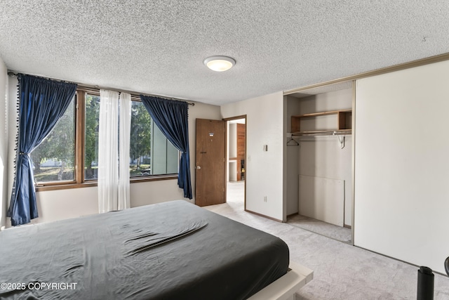 1003 Wildrose Ct # 1003, Anchorage, AK 99518 - bedroom featuring a closet, carpet flooring, and a textured ceiling