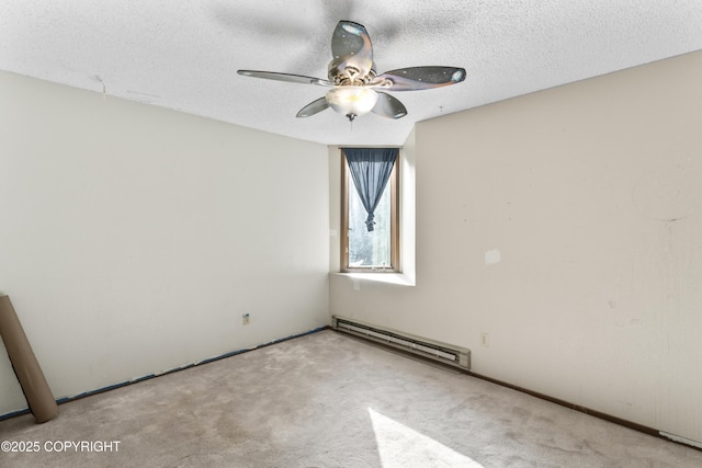 1003 Wildrose Ct # 1003, Anchorage, AK 99518 - carpeted spare room with baseboard heating, a ceiling fan, and a textured ceiling