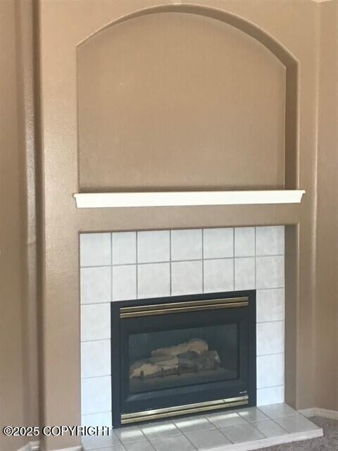 6334 Rose Hip Cir, Anchorage, AK 99507 - detailed view of a tile fireplace