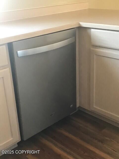 6334 Rose Hip Cir, Anchorage, AK 99507 - kitchen view of dishwasher and dark wood-style floors