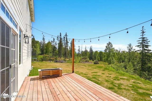 7350 E Narnia Cir, Palmer, AK 99645 - wooden terrace with a lawn