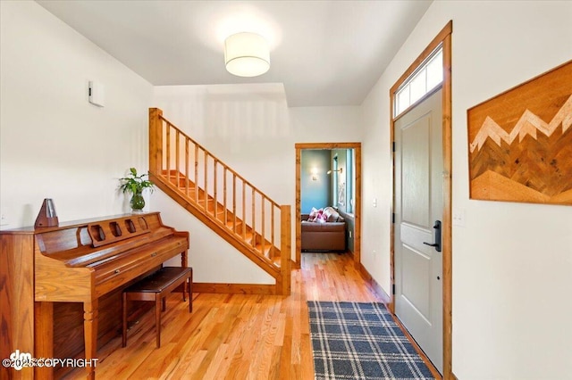 7350 E Narnia Cir, Palmer, AK 99645 - foyer featuring stairs and wood finished floors