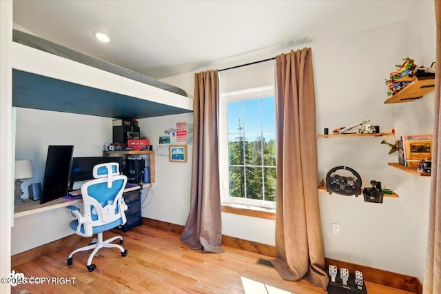 7350 E Narnia Cir, Palmer, AK 99645 - office area with baseboards and wood finished floors