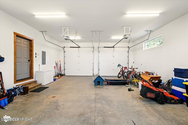 7350 E Narnia Cir, Palmer, AK 99645 - garage with electric panel and a garage door opener