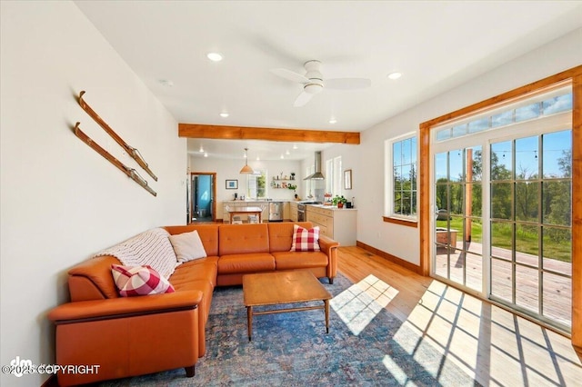 7350 E Narnia Cir, Palmer, AK 99645 - living room with light wood finished floors, recessed lighting, ceiling fan, baseboards, and beam ceiling
