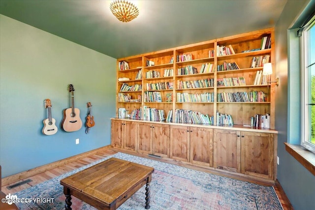 7350 E Narnia Cir, Palmer, AK 99645 - living area featuring wood finished floors and baseboards