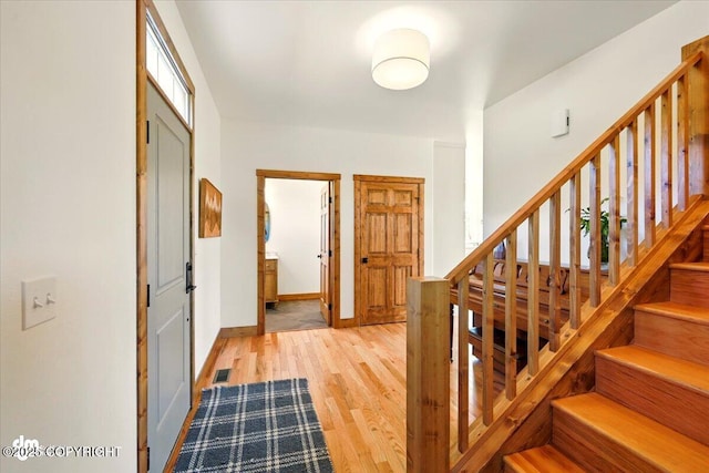 7350 E Narnia Cir, Palmer, AK 99645 - entryway featuring light wood finished floors, stairs, and baseboards