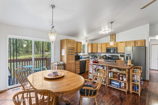 7879 W Sally Ct, Wasilla, AK 99623 - dining room featuring lofted ceiling and dark wood-style flooring
