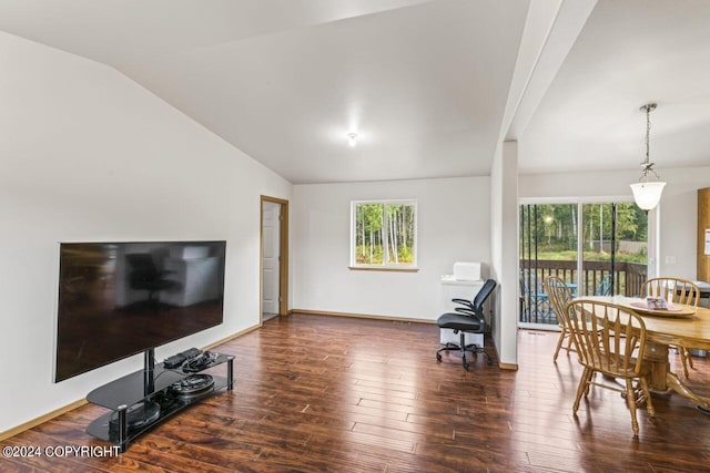 7879 W Sally Ct, Wasilla, AK 99623 - living area featuring wood finished floors, lofted ceiling, and baseboards