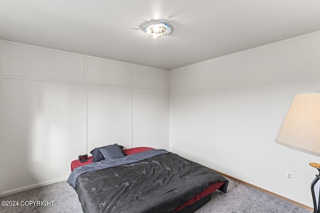 7879 W Sally Ct, Wasilla, AK 99623 - bedroom with carpet flooring and baseboards