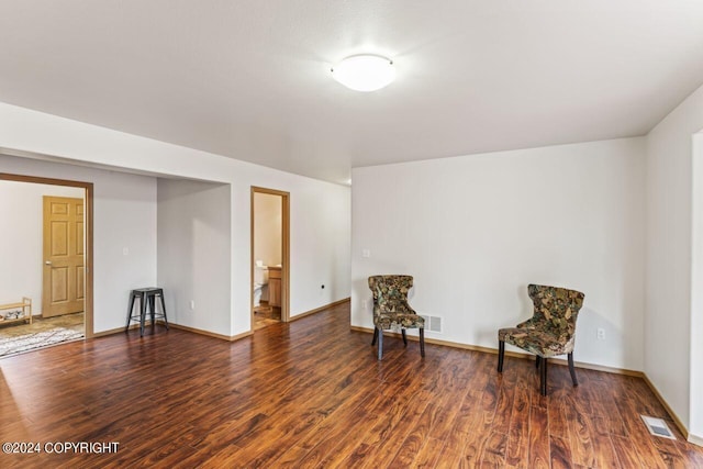 7879 W Sally Ct, Wasilla, AK 99623 - living area featuring wood finished floors and baseboards