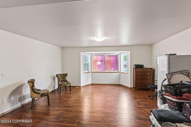 7879 W Sally Ct, Wasilla, AK 99623 - living area featuring wood finished floors and baseboards