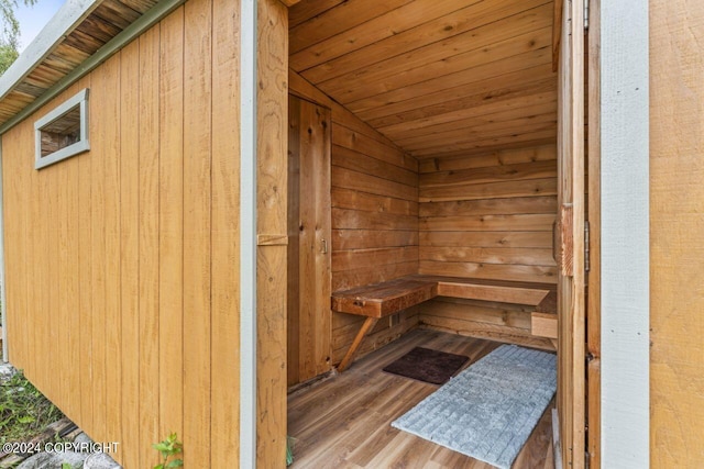 7879 W Sally Ct, Wasilla, AK 99623 - sauna featuring wood walls, wood finished floors, and wood ceiling