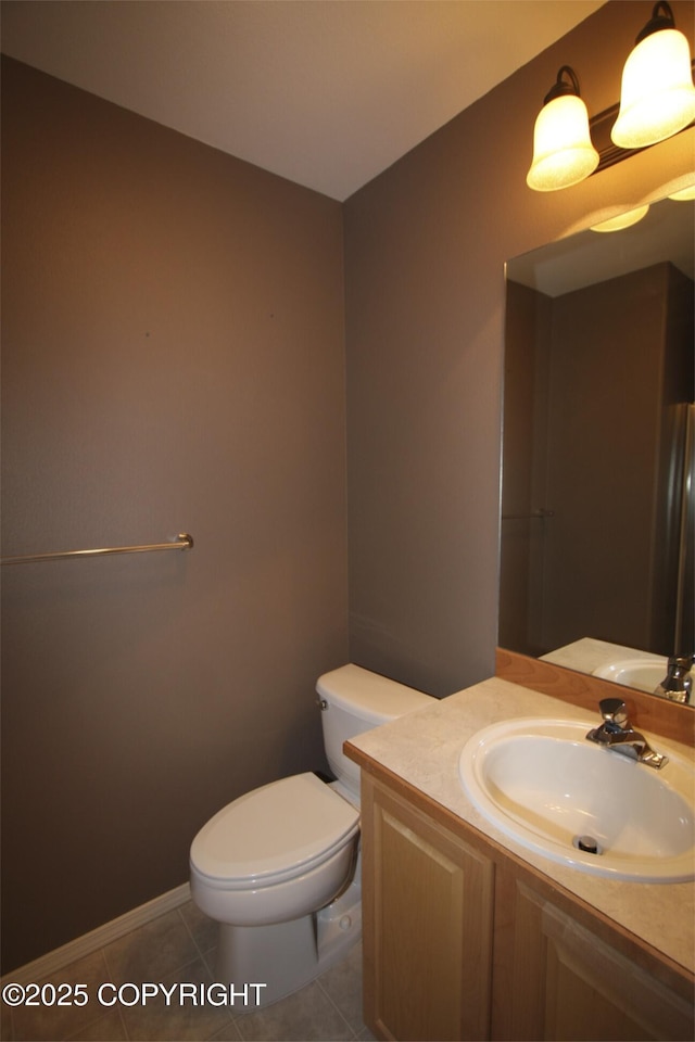 1932 Casey Cusack Loop, Anchorage, AK 99515 - half bathroom featuring toilet, vanity, and tile patterned floors