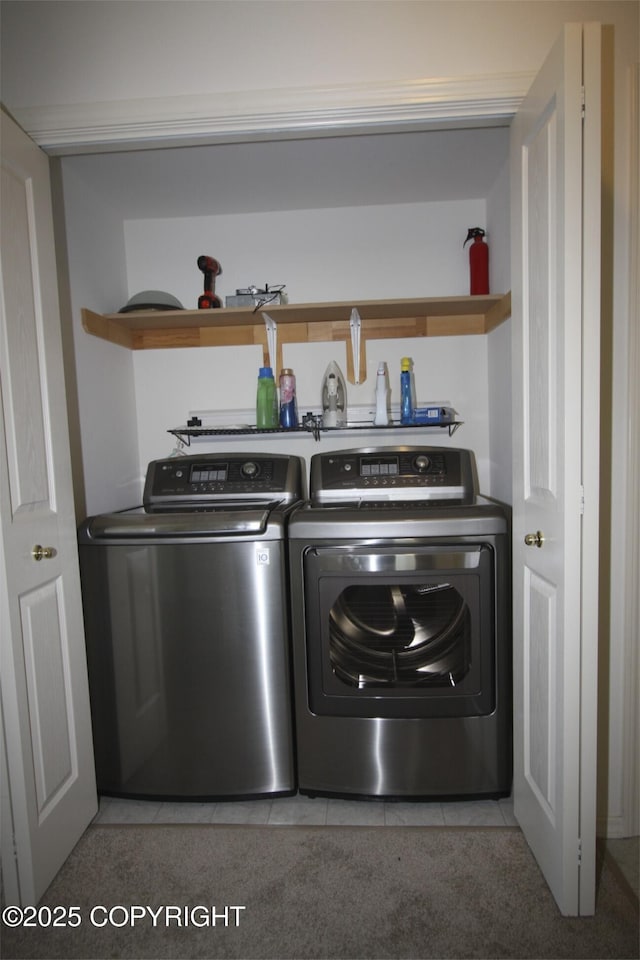 1932 Casey Cusack Loop, Anchorage, AK 99515 - laundry area with separate washer and dryer and light tile patterned floors