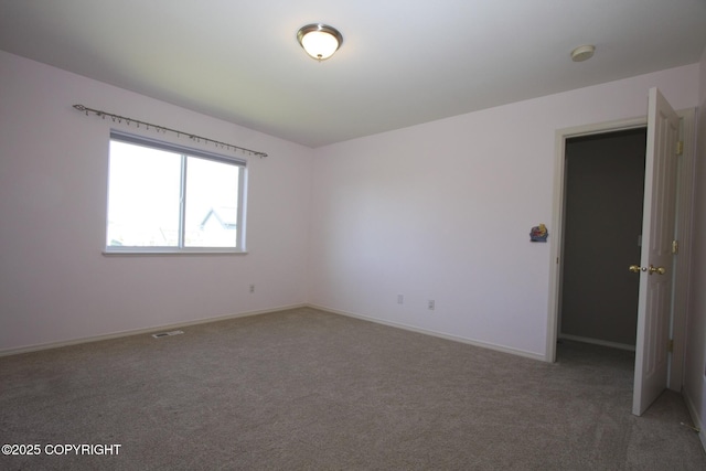 1932 Casey Cusack Loop, Anchorage, AK 99515 - carpeted spare room featuring a smoke detector and baseboards