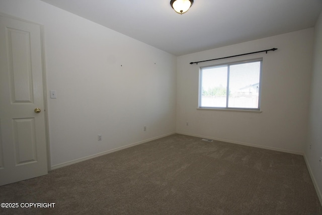 1932 Casey Cusack Loop, Anchorage, AK 99515 - carpeted spare room with baseboards