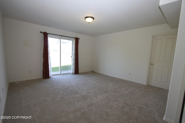 1932 Casey Cusack Loop, Anchorage, AK 99515 - unfurnished room featuring carpet flooring and baseboards