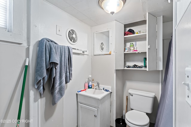 241 N Flower St, Anchorage, AK 99508 - bathroom with vanity and toilet