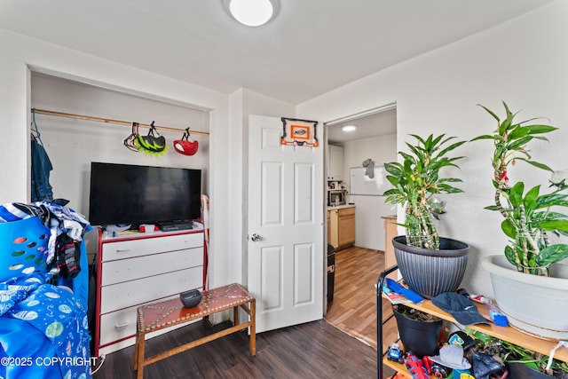 241 N Flower St, Anchorage, AK 99508 - bedroom with wood finished floors