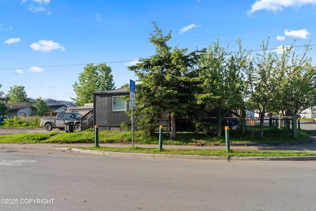 241 N Flower St, Anchorage, AK 99508 - view of property hidden behind natural elements