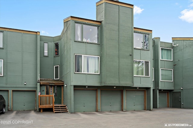 905 Wild Rose Ct # 905, Anchorage, AK 99518 - view of property with a garage