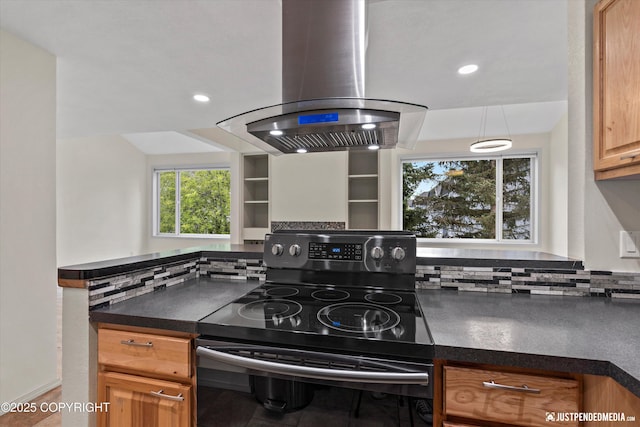 905 Wild Rose Ct # 905, Anchorage, AK 99518 - kitchen featuring black / electric stove, island exhaust hood, dark countertops, and recessed lighting