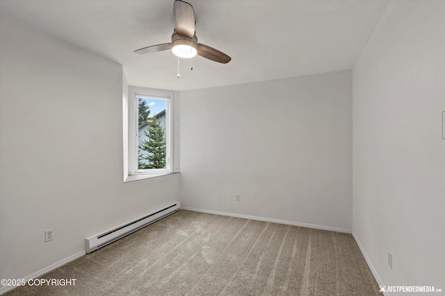 905 Wild Rose Ct # 905, Anchorage, AK 99518 - carpeted spare room with a baseboard radiator, ceiling fan, and baseboards
