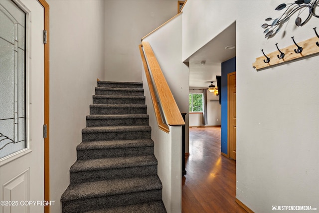 1061 E Mulchatna Dr, Wasilla, AK 99654 - staircase with wood finished floors and a ceiling fan
