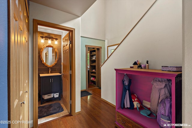 1061 E Mulchatna Dr, Wasilla, AK 99654 - corridor with wood finished floors, a sink, and baseboards