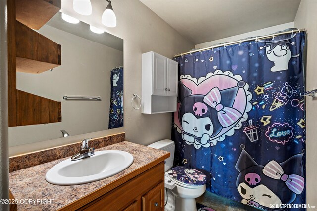1061 E Mulchatna Dr, Wasilla, AK 99654 - full bathroom featuring toilet, vanity, and a shower with curtain