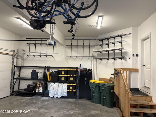 13125 W Curry Ridge Cir, Eagle River, AK 99577 - garage featuring a garage door opener