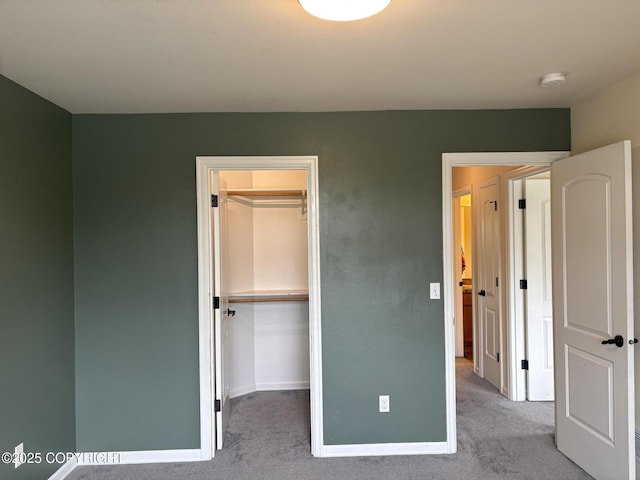 13125 W Curry Ridge Cir, Eagle River, AK 99577 - unfurnished bedroom with carpet flooring, a spacious closet, and a closet