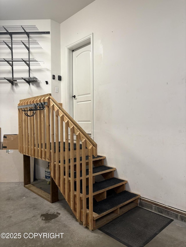 13125 W Curry Ridge Cir, Eagle River, AK 99577 - stairs featuring concrete flooring