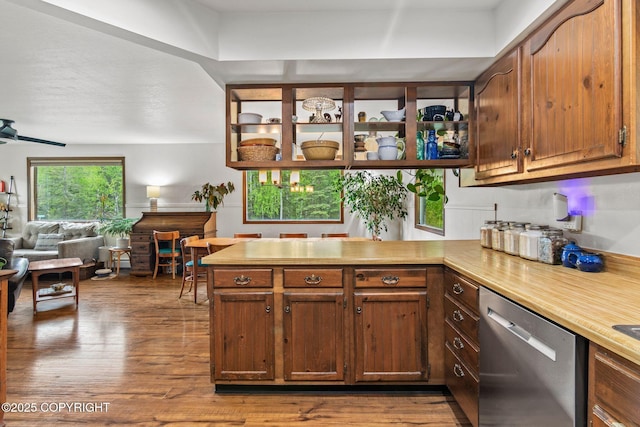 45035 Ptarmigan Pl, Soldotna, AK 99669 - kitchen featuring dishwasher, a peninsula, light countertops, and wood finished floors