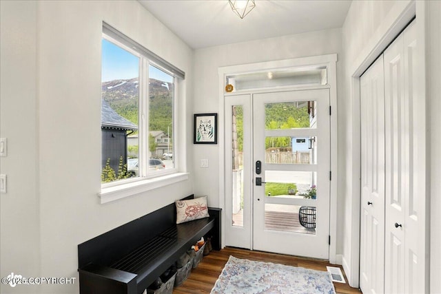 8727 Turlock Dr, Eagle River, AK 99577 - entryway with dark wood-style flooring