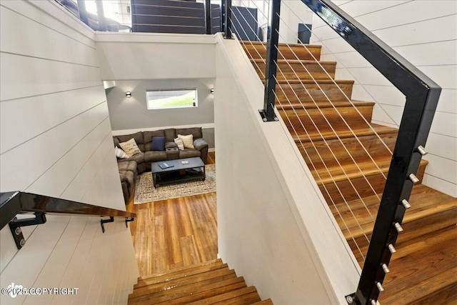 8727 Turlock Dr, Eagle River, AK 99577 - stairs with wood finished floors