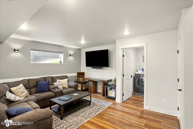 8727 Turlock Dr, Eagle River, AK 99577 - living room with washer / dryer, light wood finished floors, baseboards, and recessed lighting