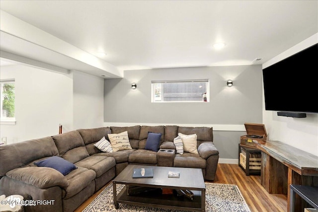 8727 Turlock Dr, Eagle River, AK 99577 - living room featuring wood finished floors, plenty of natural light, baseboards, and recessed lighting